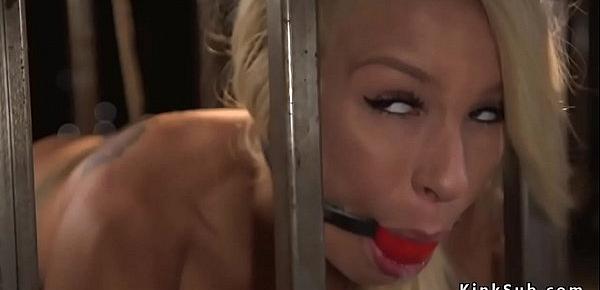  Crotch roped blonde in cage gets spanked